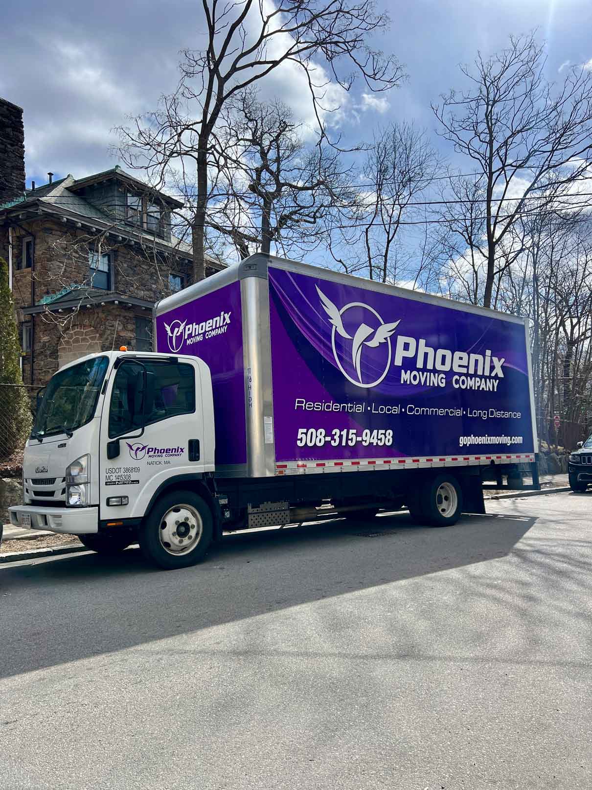 Local Moving Services Truck and tree